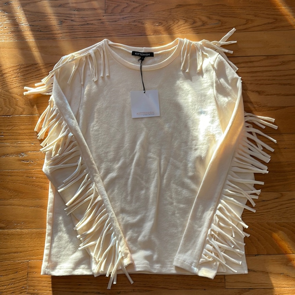 Beige French sweatshirt by kittenish size small.